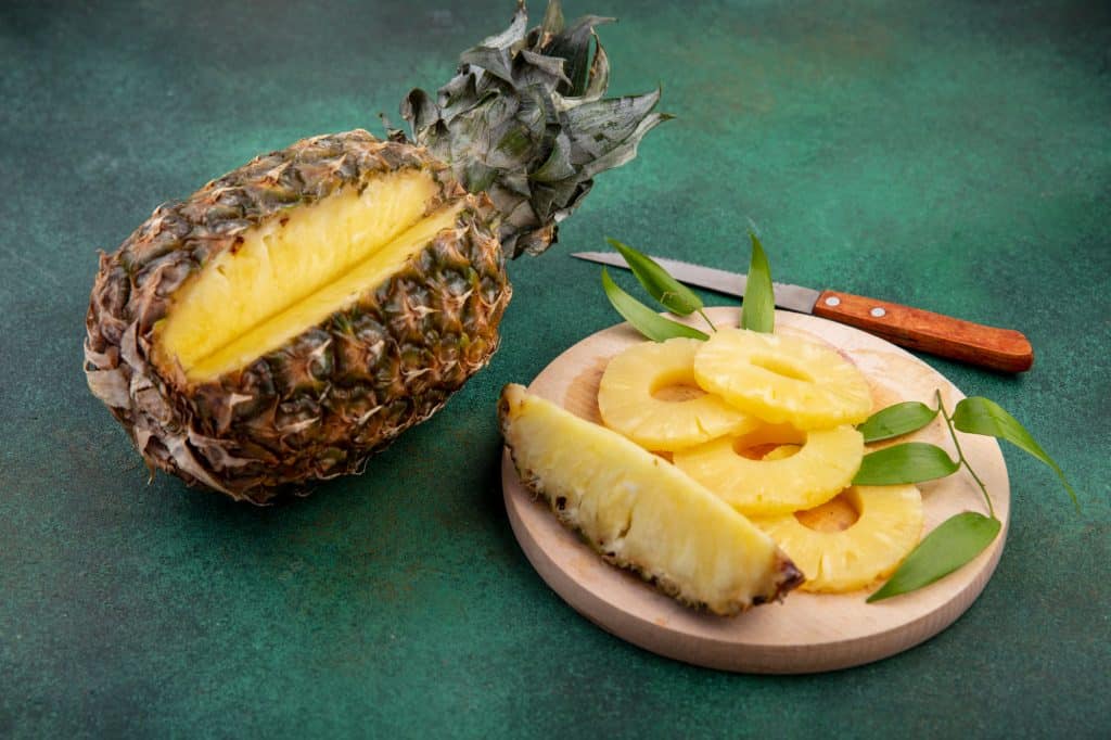 The pineapple stem and berries contain the natural enzyme bromelain. It is a member of the proteolytic class of enzymes that break down proteins.