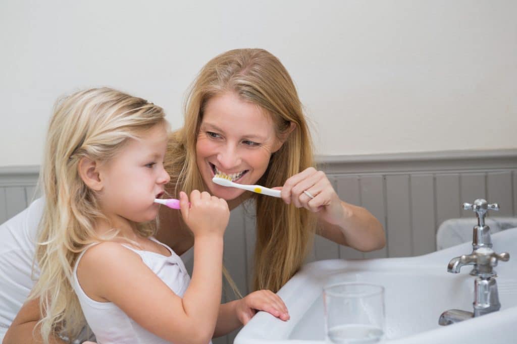 Brushing your teeth, an essential part of oral hygiene, involves using a toothbrush and toothpaste to get rid of food debris and plaque from your teeth and gums.