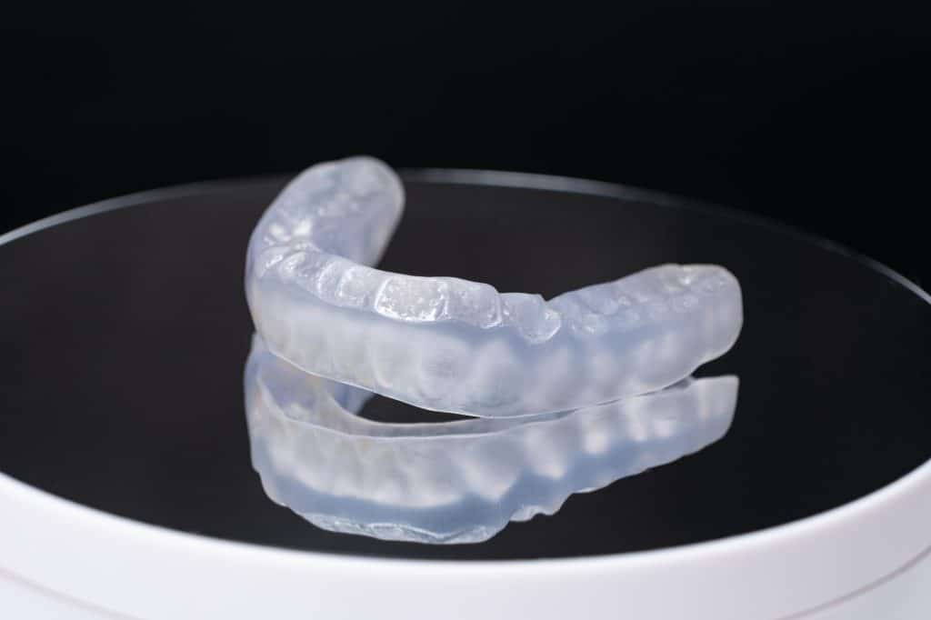 Mouth guards, commonly called mouth protectors, are dental devices worn inside the mouth to lessen damage to the teeth and surrounding tissues. 