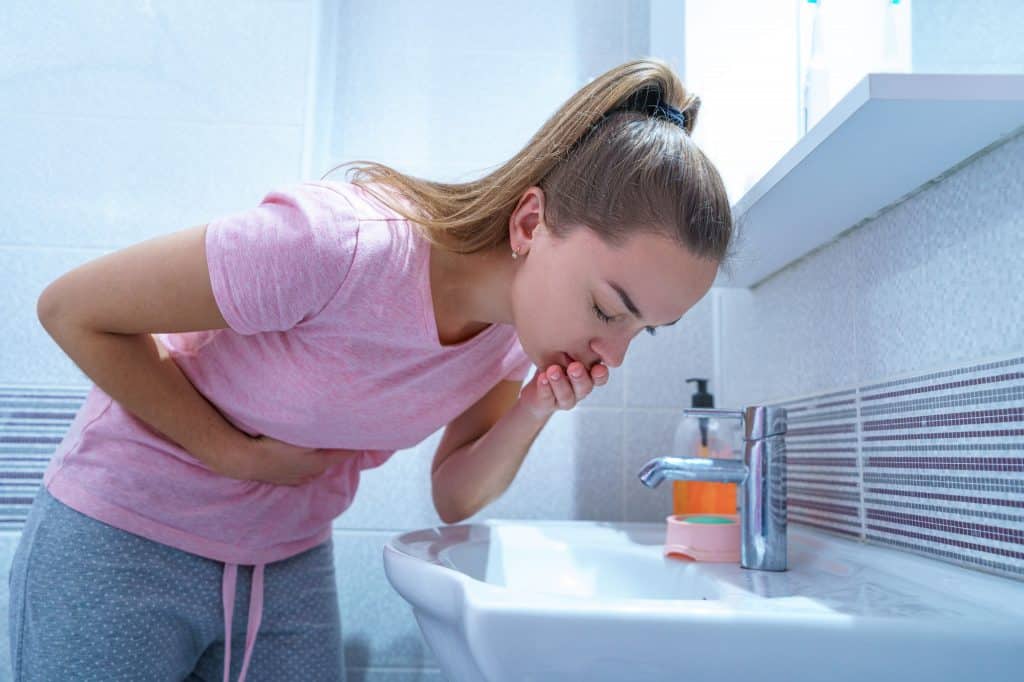 Sensation of discomfort in the stomach is given the term as Nausea. It can come along with the urge to vomit.