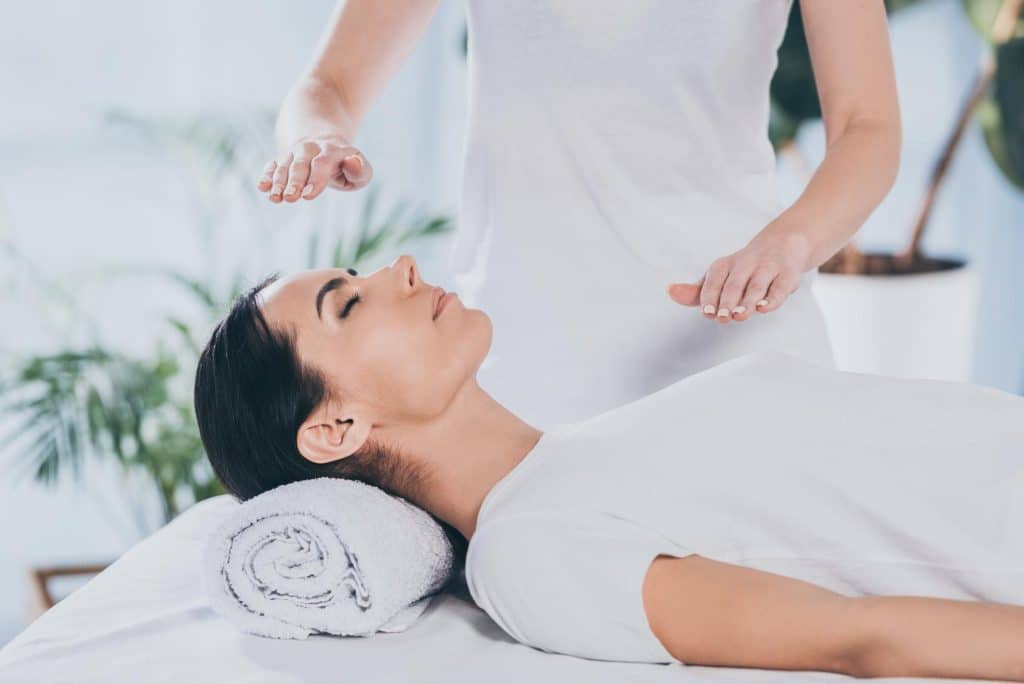 A Japanese healing method called Reiki focuses on the transmission of universal energy to promote mental, emotional, and spiritual recovery.