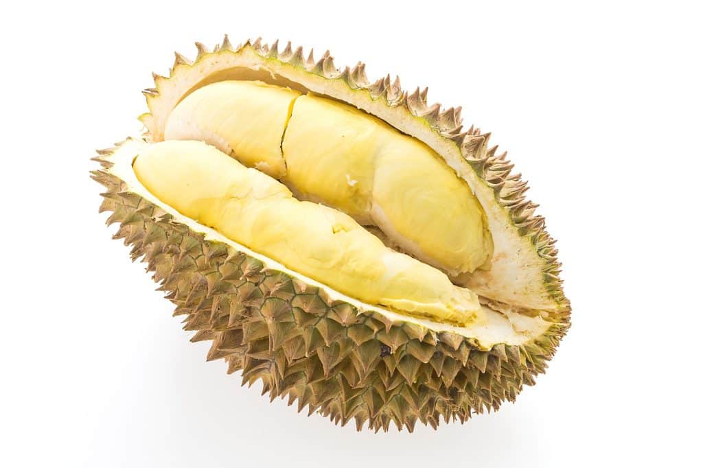 Durian, often called the "King of Fruits," is a tropical fruit known for its distinctive aroma, prickly exterior, and creamy texture. 