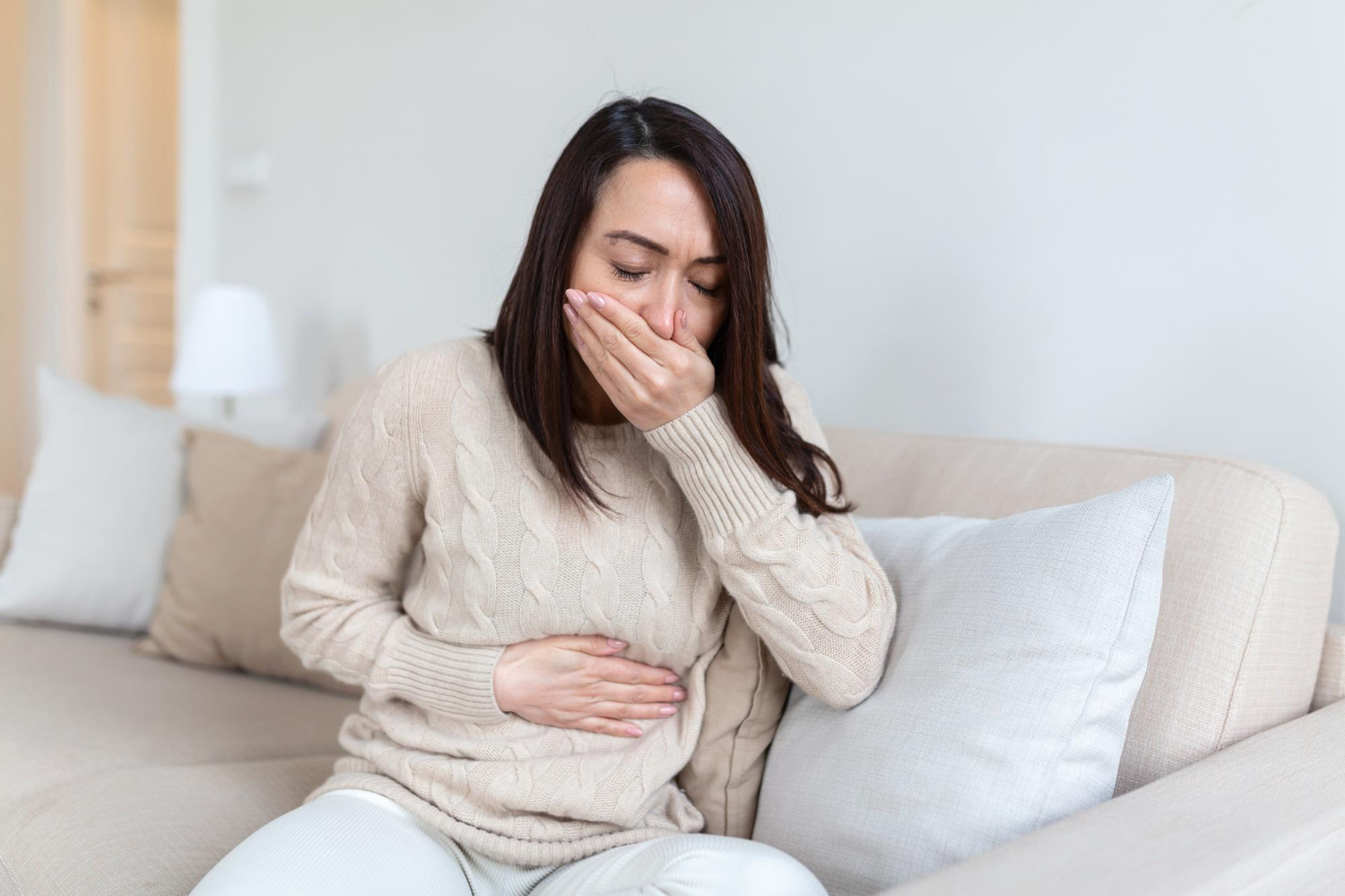 Does Constipation Cause Nausea?  Symptoms & Management